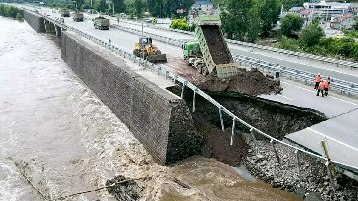 China faces devastating deluges with 30 confirmed dead