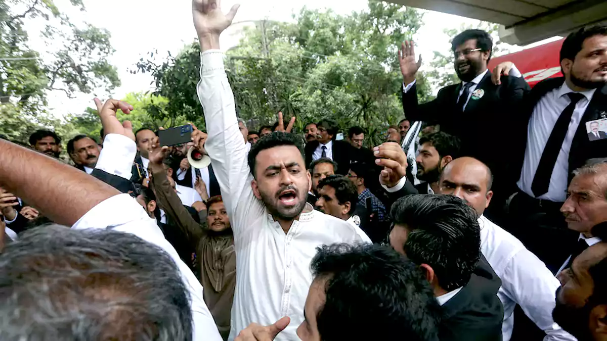 Imran Khan and his party, PTI, along with others chants slogans, during a nationwide protest demanding Khan's release