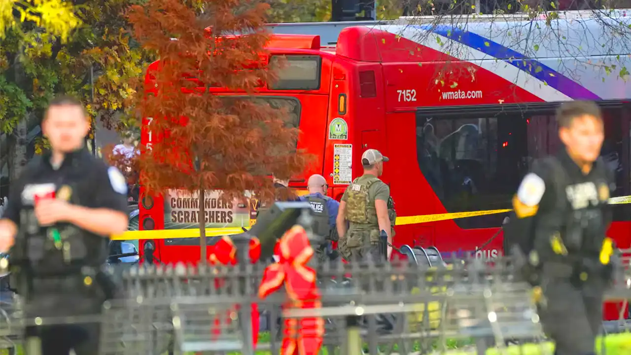 BI member walks in a cordoned-off area after two National Guard
